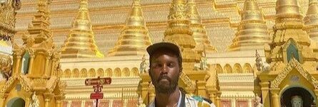 blackman standing outside golden temple